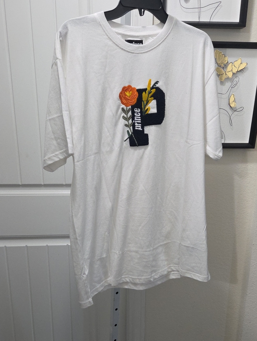 Prince White Short Sleeve Tee with Orange Floral Embroidery and Navy P Patch